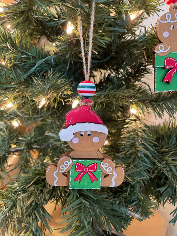 Gingerbread Santa Sitting with Present